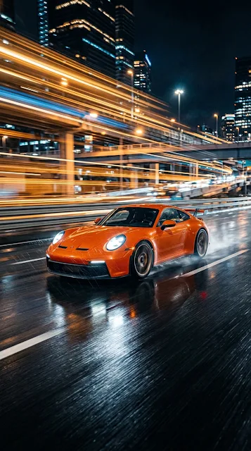 Action Sportscar Speeding Through City Streets at Night with Motion Blur - Free 4K & 8K mobile Wallpaper