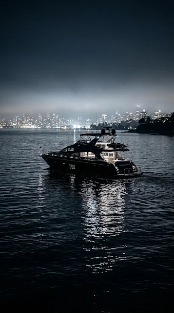 Black Yacht in Calm Midnight Waters with Fog Wallpaper - Free 4K & 8K mobile Wallpaper