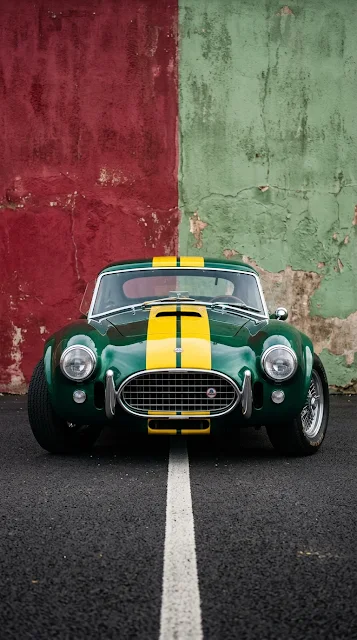 Classic Emerald Sports Car with Yellow Racing Stripes - Free 4K & 8K mobile Wallpaper