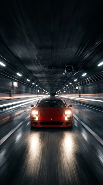 Classic Red Sports Car Speeding Through Dark Tunnel at Night - Free 4K & 8K mobile Wallpaper
