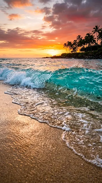 Close-up of Clear Turquoise Ocean Waves on Sand at Sunset - Free 4K & 8K mobile Wallpaper