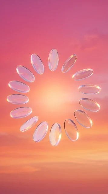 Floating Iridescent Glass Disks on a Pink and Orange Gradient Background - Free 4K & 8K mobile Wallpaper