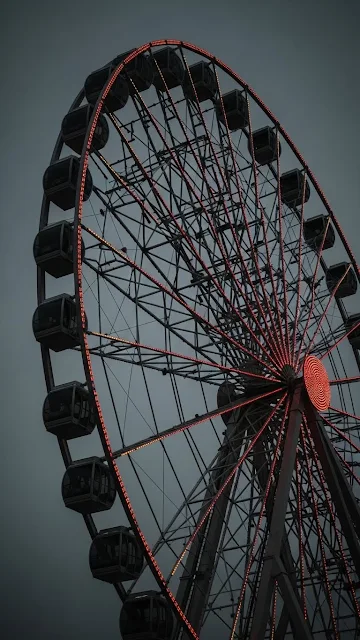 Giant Ferris Wheel with Red Lights at Dusk - Free mobile Wallpaper