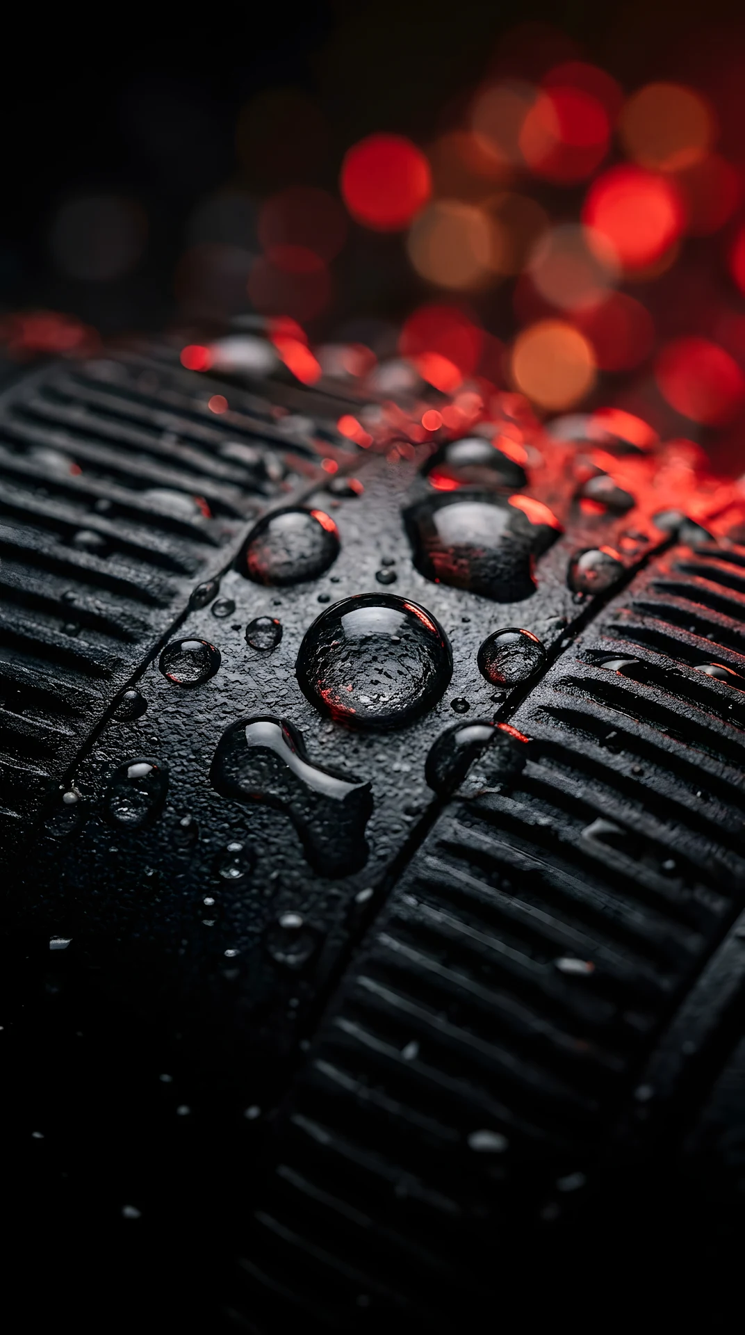 Macro Close-up of Water Beads on Black Ribbed Texture - Free 4K mobile Wallpaper