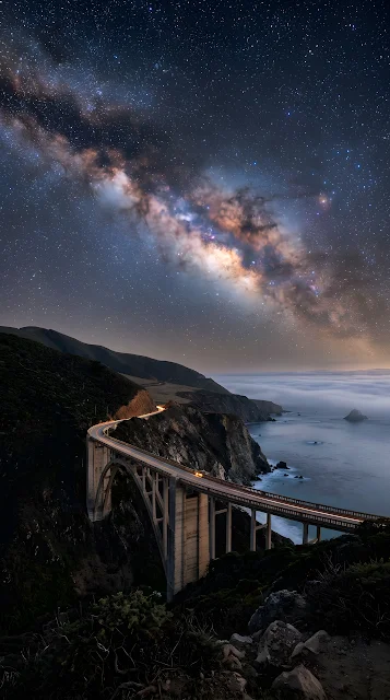 Milky Way Galaxy Over Historic Coastal Arch Bridge At Night - Free mobile Wallpaper