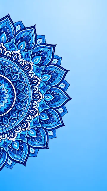 Detailed blue mandala ornament positioned on the left side over a soft gradient cyan background.