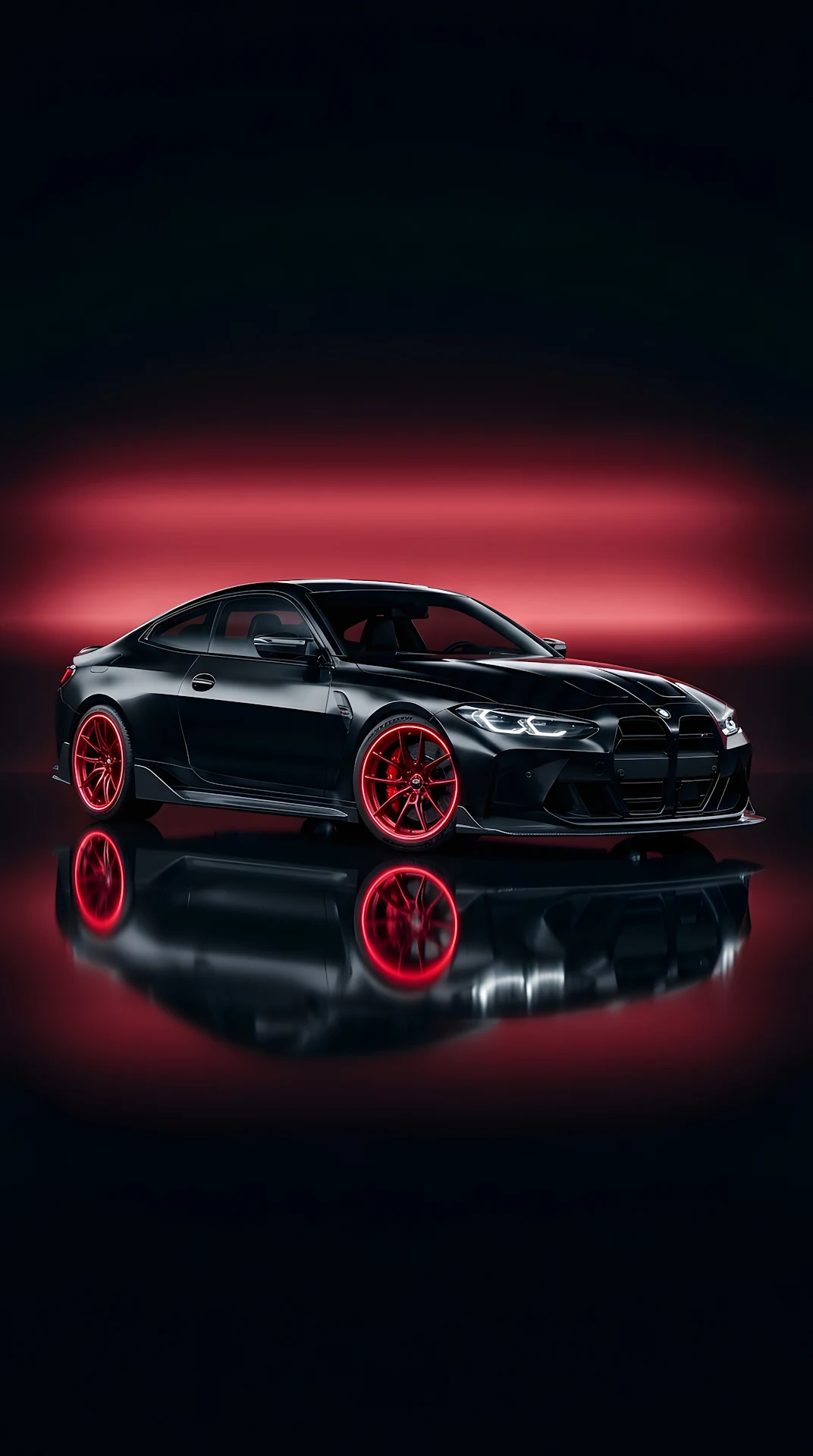 Sleek Black Sports Car on Glossy Floor with Red Lighting - Free 4K mobile Wallpaper