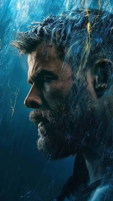 Profile portrait of bearded Thor surrounded by blue mist and crackling electric lightning sparks.