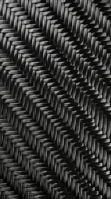 Ultra-Realistic Carbon Fiber Weave with Glossy Finish - Free 4K & 8K mobile Wallpaper